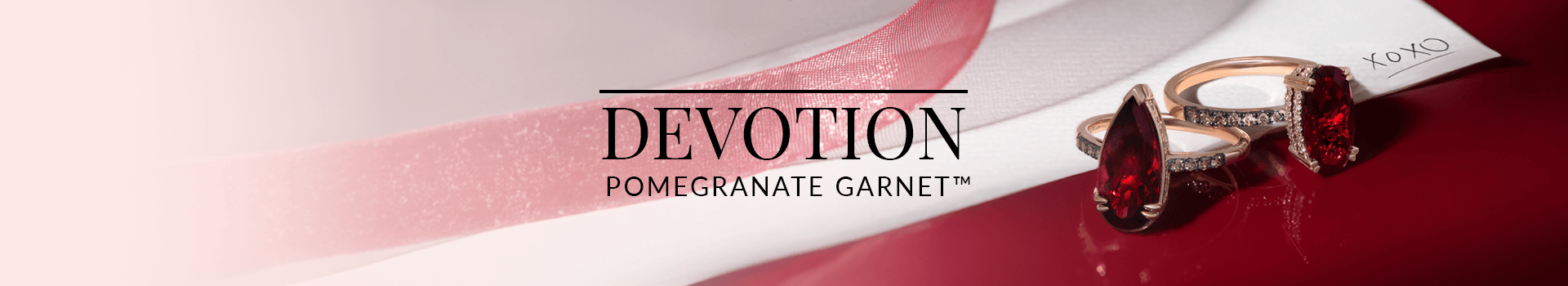 Passion-red pomegranate garnet rings set in rose gold and accented with pavé diamonds, paired with a romantic note and ribbon, from Le Vian’s Devotion collection.