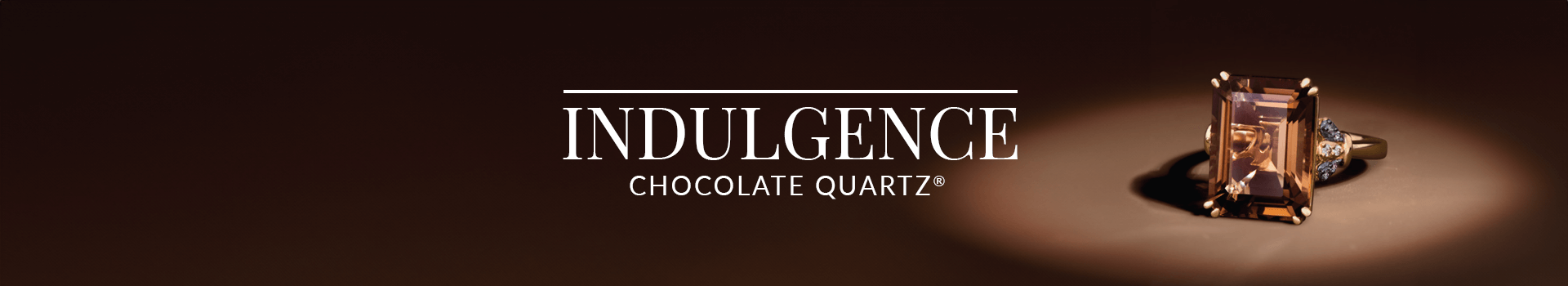 Emerald-cut Chocolate Quartz® ring with diamond accents set against a rich brown background, from Le Vian’s Indulgence Chocolate Quartz® collection.