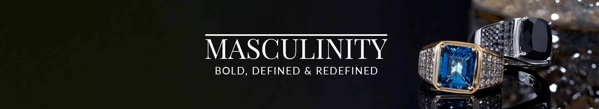 Two bold men’s rings—one with a rectangular blue gemstone and the other with a black gemstone and black pavé diamonds—against a dark, masculine backdrop.