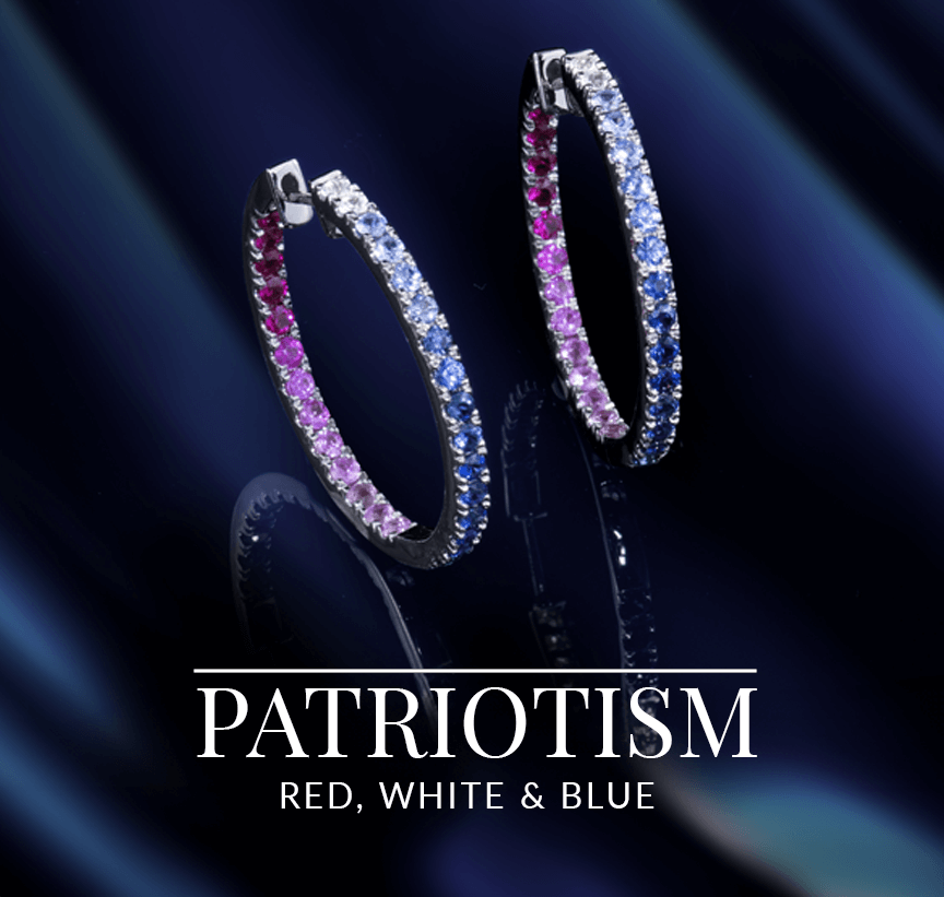 Red, white, and blue gradient gemstone hoop earrings from Le Vian’s Patriotism Red, White & Blue collection, set against a dramatic deep-toned background.