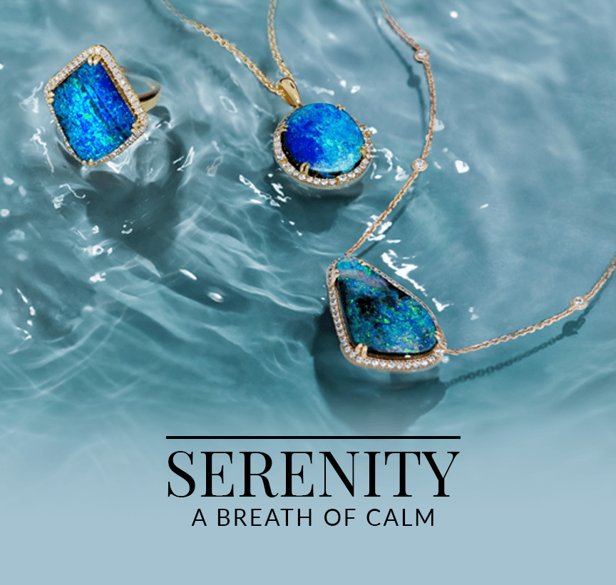 Trio of vivid blue Austrailian opal pendants floating on tranquil water, representing Le Vian’s Serenity: A Breath of Calm jewelry collection.