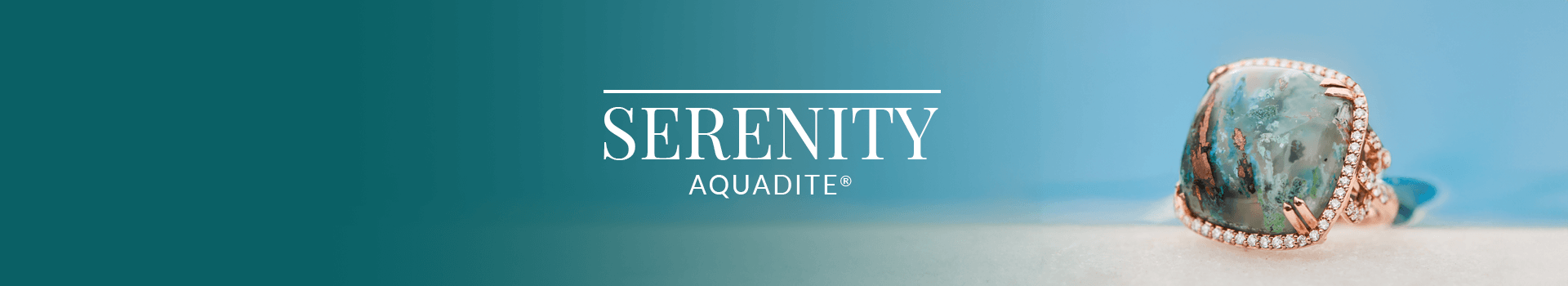 Aquadite® gemstone ring in rose gold and diamond setting, showcasing a marbled oceanic pattern, resting against a serene blue backdrop.