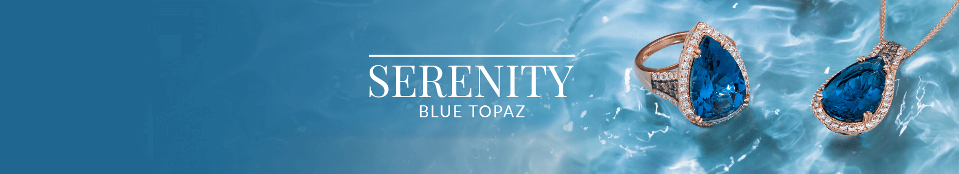 Elegant pear-cut blue topaz ring and pendant with diamond halos set against rippling blue water, from Le Vian’s Serenity Blue Topaz collection.