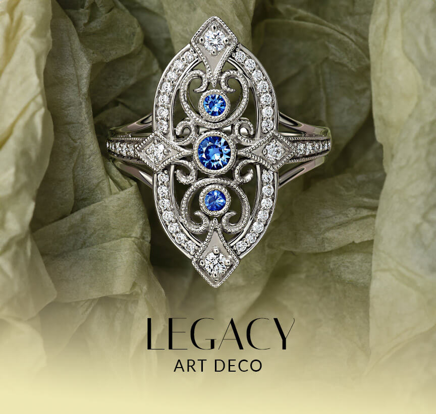 Le Vian® Art Deco-inspired ring in white metal with blue gemstones, white diamonds and ornate geometric detailing.