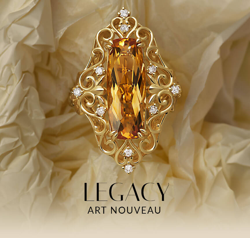 Le Vian® Art Nouveau-inspired ring with a long golden center gemstone, white diamonds and ornate scrolling gold details.